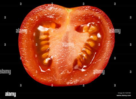 Inside Of A Tomato On Black Background Stock Photo Alamy