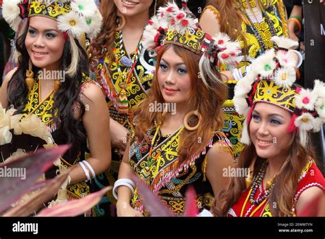 A Shouldered Dayak Girl Wearing A Traditional Dayak Outfit Stock Photo