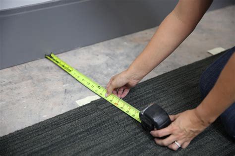 Finally, cut any vent openings and reinstall the molding on the baseboards. How to Install Carpet Tiles | how-tos | DIY