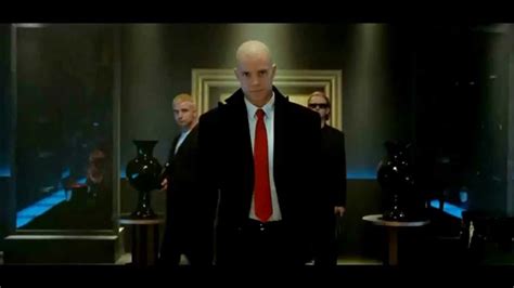 In an undisclosed location, a group of young boys are receiving tattoos of bar codes on the back of their shaved heads; Hitman (2007) Justice - DVNO - YouTube