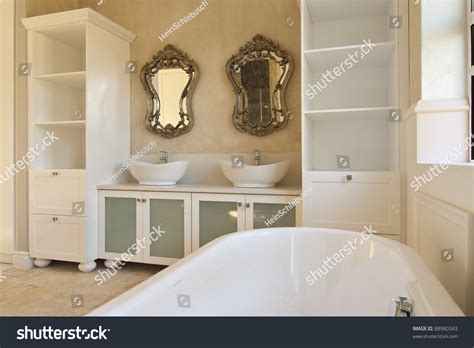 The same handsome dark wood tone links the aesthetic of each interior and exterior room. Empty Bathroom Inside A Modern House Stock Photo 88980343 ...