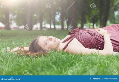 Beautiful Young Girl Lying On Grass In Summer Park Stock Image Image