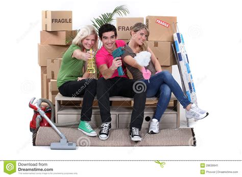 Young People Moving In Together Stock Image - Image of gray, friendship ...