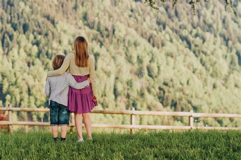 Little Boy And Girl Resting In Mountains Stock Image Image Of Couple