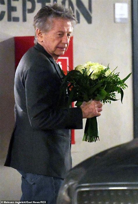 director roman polanski 86 steps out with white roses in poland after new sexual assault