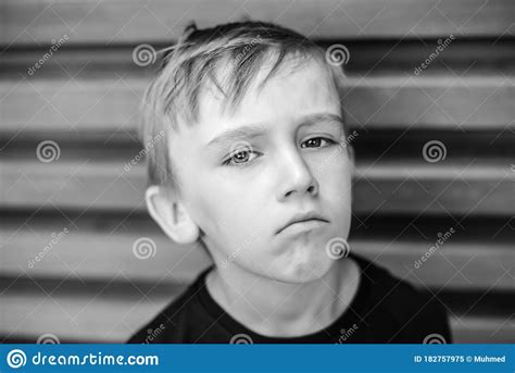 Portrait Of Sad Young Boy Outdoors Boredom Child Stock Image Image