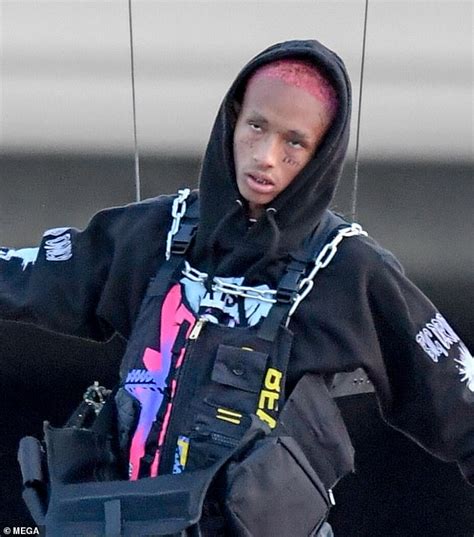 Jaden Smith Soars Through Pink Cloud While Strapped In Wire Rig On Set