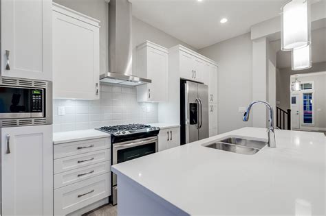 When you hire a pro to refinish your bathroom or kitchen cabinets, that price includes labor, materials like stain and top coat and minor repairs. Remodel kitchen on a budget - CCSRemodeling