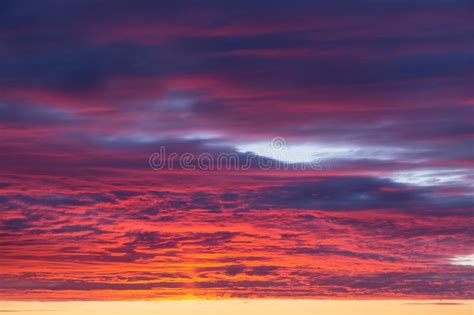 Beautiful Dramatic Sunrise Blue Sky With Orange Colored Clouds Stock