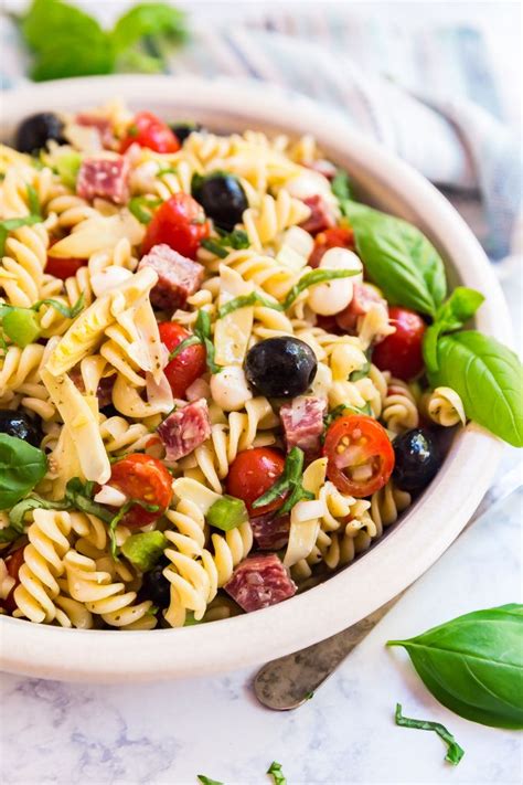 This lightly dressed pasta salad gets lots of flavor from kalamata olives and basil. Antipasto Pasta Salad | Recipe | Antipasto pasta salads ...