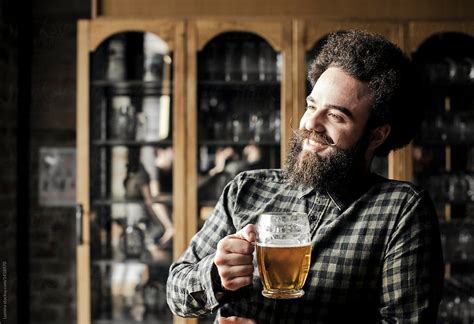 Man Drinking Beer At Bar By Stocksy Contributor Lumina Stocksy