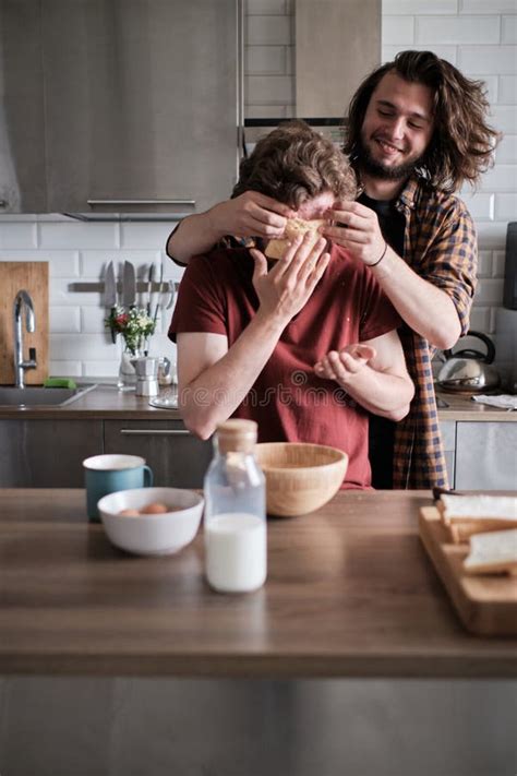 Gay Couple Goofying At The Kitchen While Making Breakfast Stock Image Image Of Goofy