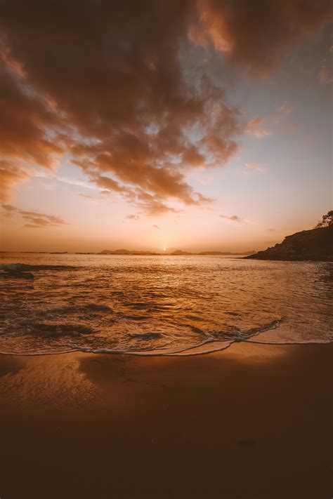 Seashore Scenery During Sunset · Free Stock Photo