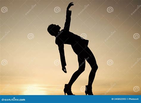 Female Silhouette On Sunset Woman Dance In Dark Dark Figure Shape