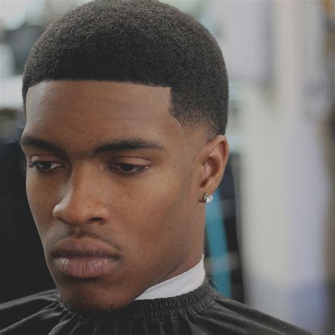 Sep 24, 2016 · once the standard haircut for cadets enlisting in the military, the mid fade is a cut that starts at the point above the ears and takes hair completely skintight, meaning the sides and the back are shaved very close to the skin, leaving a clean, crisp outline. 25 Taper Fade Haircuts for Black Men - Fades for the Dark ...