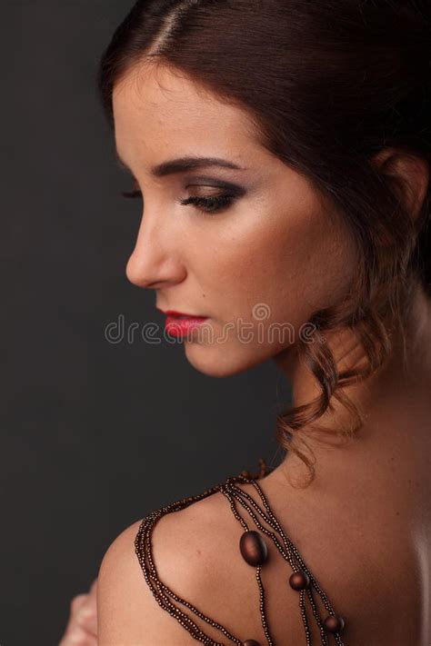 Naked Beautiful Woman Wearing Necklace Around Her Neck And Shoulders Closeup Portrait With