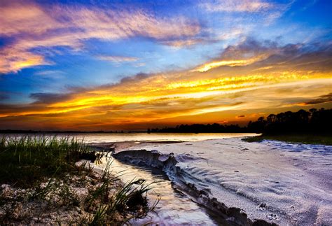 Landscape Beach Sunset Golden Sun Rays Stream To The Sea Photograph By