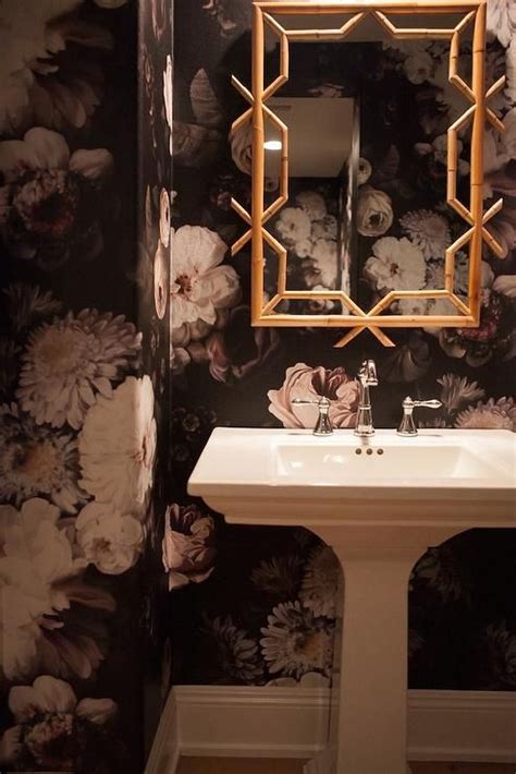 Black And Gold Powder Room Features Walls Clad In Black And White