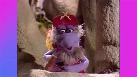 He has a long nose and big movable eyes, and a big tuft of yellow hair on his head. Fraggle Rock: Wembley Chooses a Job - YouTube