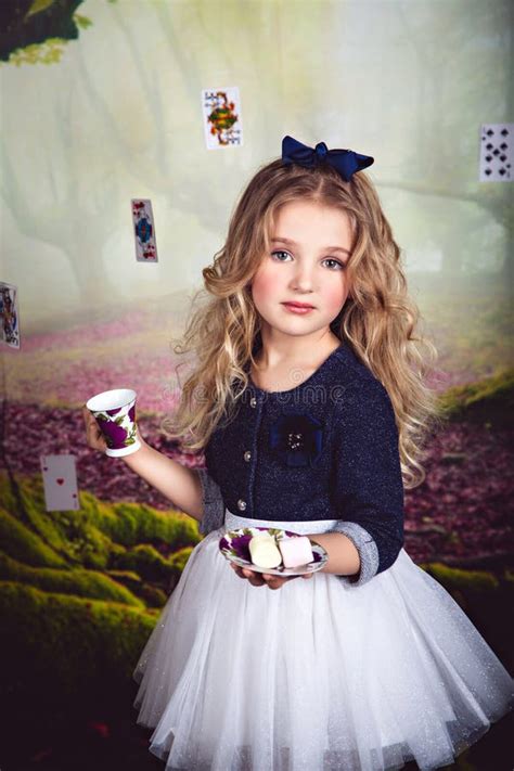 Cute Little Girl As Alice In Wonderland Stock Image Image Of Carroll