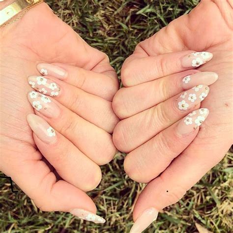 Almond Nails Daisies For Days A Nude Base Color With 60s Inspired
