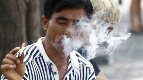 Beijing Public Smoking Ban Begins Bbc News