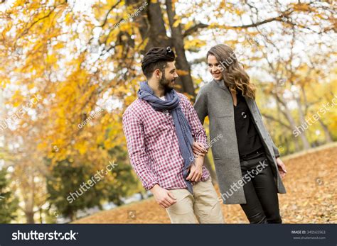 Young Couple In The Autumn Park Stock Photo 340565963 Shutterstock