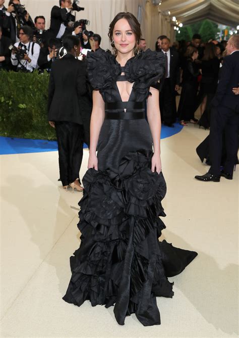 Dakota Johnson Wears Gothic Gucci on the Met Gala 2017 Red Carpet | Vogue