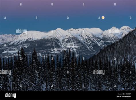 Full Moon Rising Over Canadian Rockies Viewed From Esplanada Range