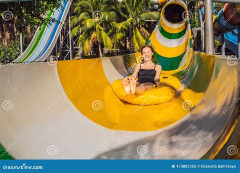 Happy Woman Going Down A Water Slide Stock Image Image Of Leisure