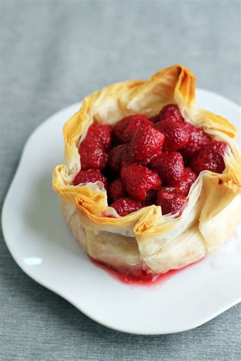 Brushing the sheets of phyllo dough with a mix of honey and warm water rather than melted butter keeps the fat content in check. Brie Phyllo Torte with Fresh Raspberries | Recipe | Food ...