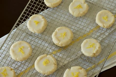 These easy lemon gooey butter cookies are seven ingredient cookies that just melt in your mouth. Zesty Lemon Cream Cheese Cookies | River | Copy Me That