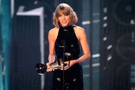 Taylor Swifts Sequined Jumpsuit At Iheartradio Awards 