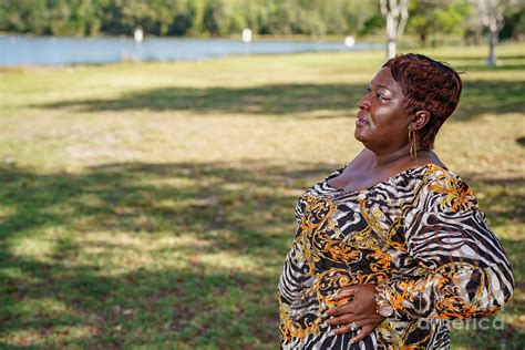 Image Of A Plus Size Model Bbw Posing Outdoors In The Park Photograph