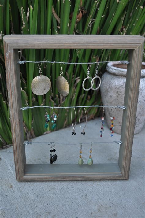 Remember you don't have to have now all you need to do is add your jewelry, and enjoy your new diy earring stand! Four Harp Designs: Tutorial: DIY Earring Display & Organizer