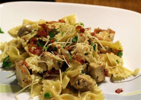 Chicken should reach an internal temperature of 165°f. Chicken and Farfalle Pasta in a Roasted Garlic Cream Sauce ...