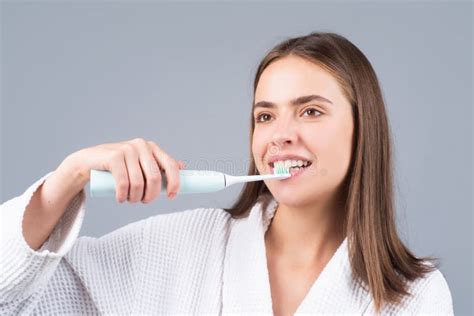Young Woman Brushing Teeth Beautiful Smile Of Young Woman With Healthy