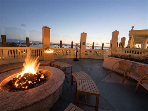 40th floor bar with window seating, bar and grouped areas. Manchester Grand Hyatt San Diego - Go San Diego