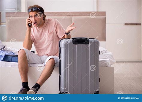 the man with suitcase in bedroom waiting for trip stock image image of departure packed