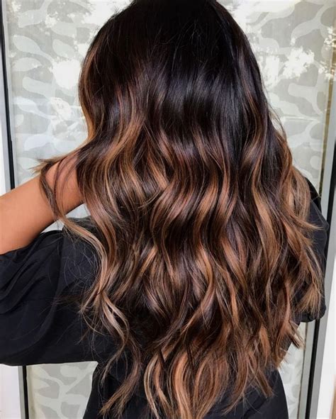 Dark brown base @nikkilee901 lee is also responsible for this balayage look, which uses a base of dark brown hair to make caramel blonde highlights pop. Very Dark Brown Hair with Caramel Highlights # ...