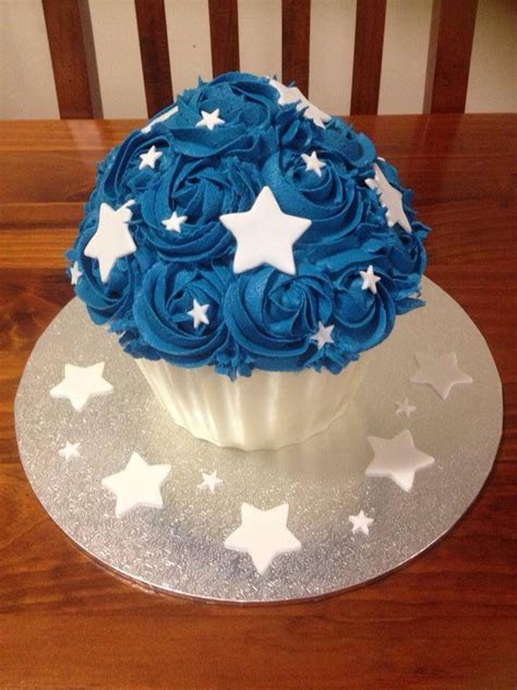 Boys Giant Cupcake With Stars For A 1st Birthday Cake Smash Photo Shoot