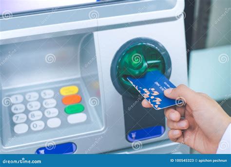 Woman`s Hand Inserting Debit Card Into An Atm Stock Image Image Of Chip Automatic 100545323