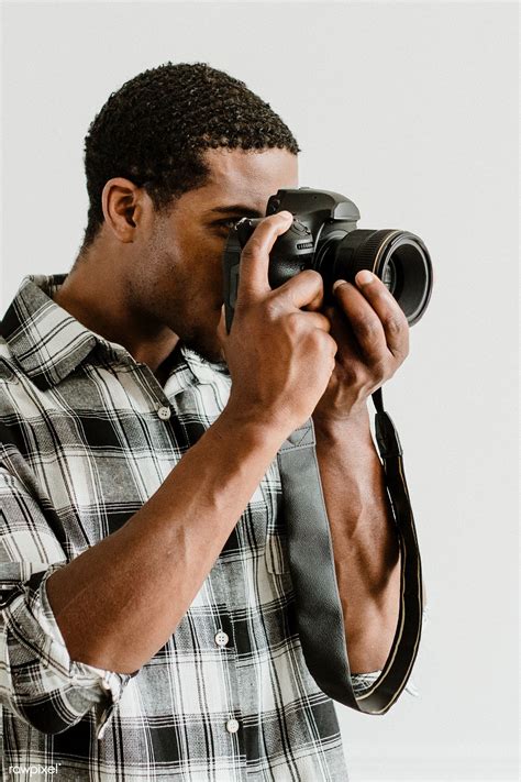 Male Photographer Holding A Camera Premium Image By