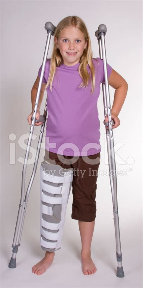 Girl On Crutches Stock Photos