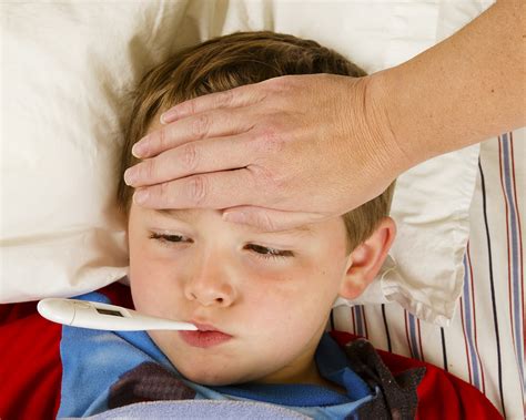 Sick is one of the world's leading producers of sensors and sensor solutions for industrial automation applications. Sick child boy being checked for fever and illness while ...