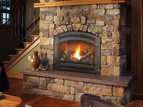 The cultured stone veneer on the fireplace is a light alternative stone, with all the aesthetic properties of the actual stone. Gas Fireplaces | Acme Stove & Fireplace VA