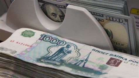 Russias Ruble Falls Below 56 To Us Dollar For First Time This Year