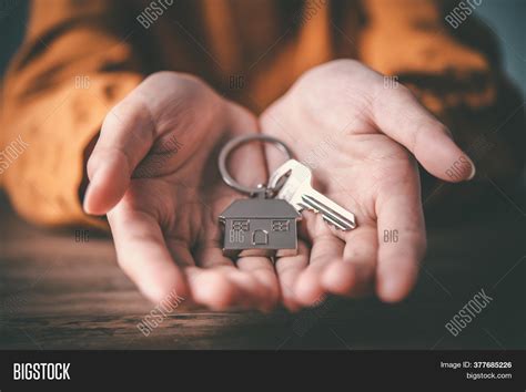 Holding House Keys Image And Photo Free Trial Bigstock