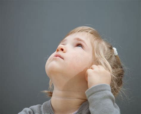 Beautiful Little Girl Looking Up Stock Photo Image Of Innocent