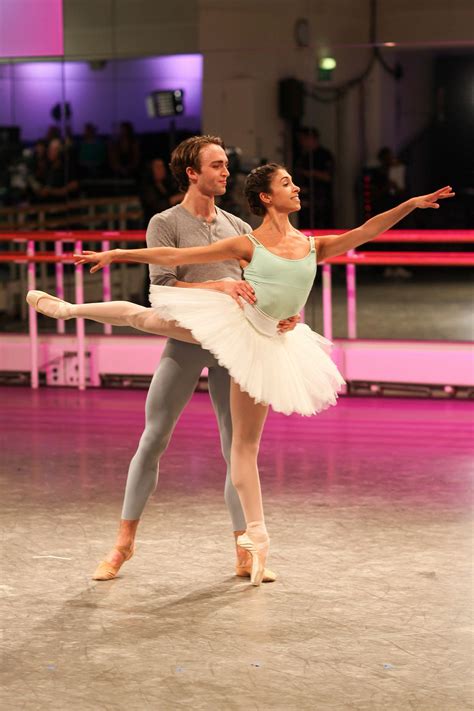 Two Ballerinas Are Performing On The Dance Floor